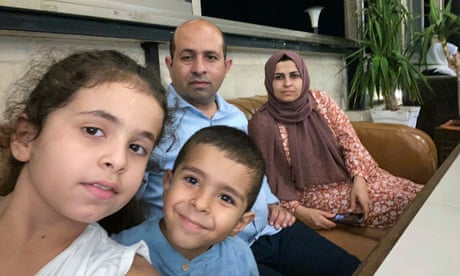 Bassem Abudagga, his wife Marim and two young children, Talya and Karim, at their home in Gaza before the outbreak of war.