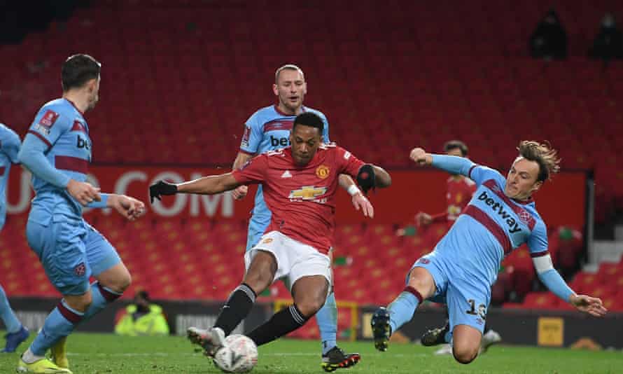 Anthony Martial misses a chance as West Ham defenders hold the hosts at bay.