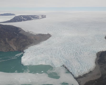 A huge glacier in Greenland meets the sea