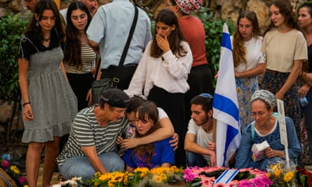 Mourners attend the funeral of Israeli soldier Shilo Rauchberger at the Mount Herzl cemetery in Jerusalem.