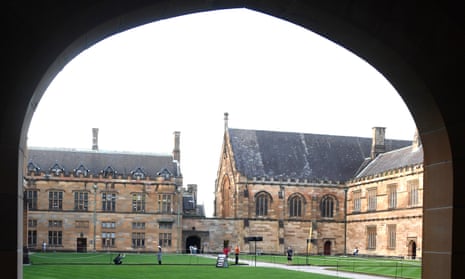 A student reads at the Quadrangle of the University of Sydney.