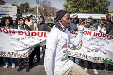 An anti-foreign group protest outside the Krugersdorp, South Africa, magistrates court