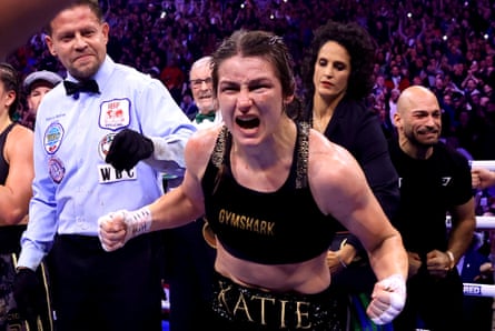 Katie Taylor celebrates becoming undisputed world super-lightweight champion after her rematch with Chantelle Cameron in November 2023.