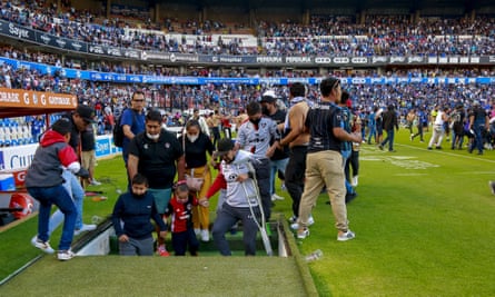 Mexican soccer game brawl: At least 26 injured as fights break out at Liga MX game between Querétaro and Atlas fans