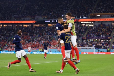 Mbappe is celebrating with his teammates.