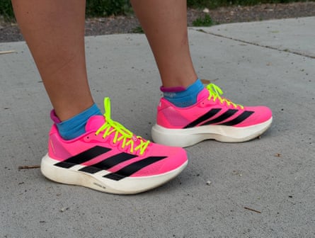 A person wearing adidas adizero outside