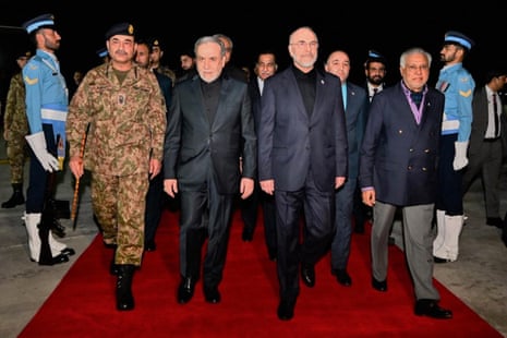 Asim Munir in military uniform walking alongside Iran’s foreign minister Abbas Araghchi, Iran's parliament speaker Mohammad Bagher Qalibaf, and Ishaq Dar.