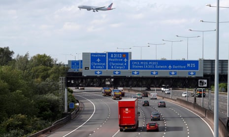 Traffic is seen on the M25 motorway around greater London