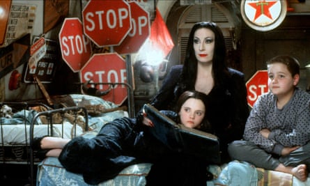 ‘I took all the fake stuff, made a pile, and set it on fire’ … Huston in The Addams Family with Christina Ricci and Jimmy Workman.
