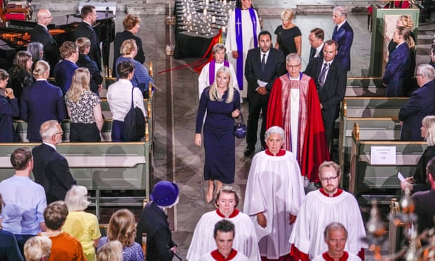 Norway’s Crown Princess Mette-Marit and Rev. Olav Fykse Tveit, leave after a memorial service in Oslo Cathedral.