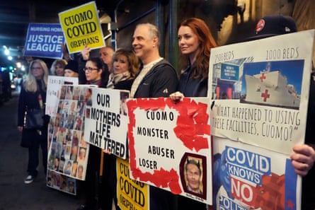 Demonstrators, including Lindsey Boylan, second from right, a former aide to former Governor Andrew Cuomo, who accused him of an unwanted kiss, stand outside a fundraiser in New York, on Tuesday.