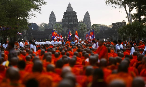 Buddhist monks attend a ceremony at the Angkor Wat temple to pray for peace and stability in Cambodia.