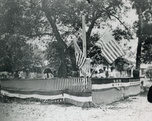 Flags and bunting greet the returned soldier at the Emancipation Day Juneteenth Celebration at Eastwoods Park, north of UT Campus, 19 June 1900