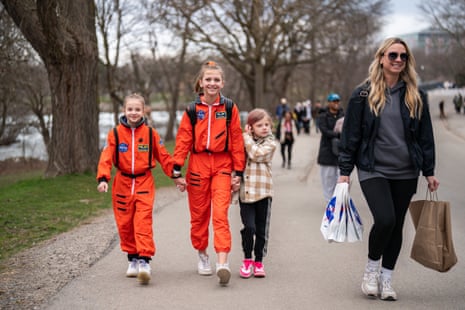 Sisters Reese, 9, Hailey, 12, and Wrenley, 7, arrive wearing NASA outfits ahead of the Solar Eclipse on in Niagara Falls, New York.