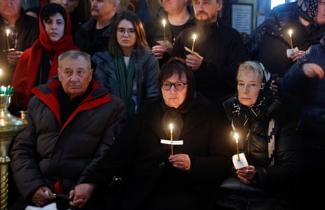 Lyudmila Navalnaya and Anatoly Navalny, the parents of Alexei Navalny, attend a funeral service and a farewell ceremony for their son in Moscow on Friday.