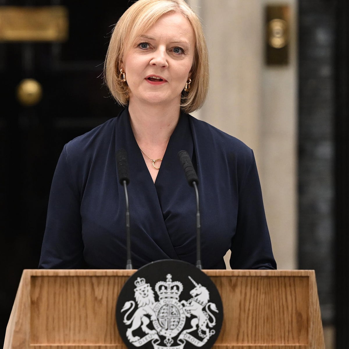 Liz Truss vows to 'ride out the storm' in first speech as PM | Liz Truss | The Guardian