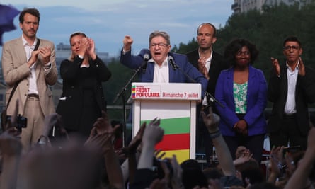 France Unbowed founder, Jean-Luc Mélenchon (centre), delivers a speech after the second round of the French legislative elections, 7 July 2024.