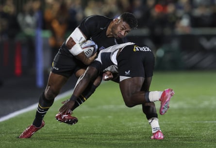 Amanaki Mafi, of Newcastle Red Bulls, is tackled by Rotimi Segun, of Saracens