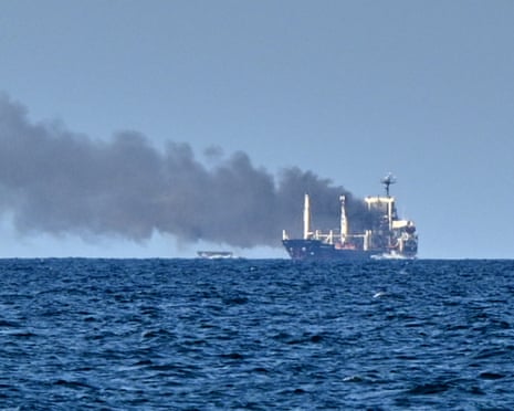 Smoke rises from the grain carrier Golden Leo under the Guinea-Bissau flag after Russian missile strike in the Black Sea close to Odesa, Ukraine.