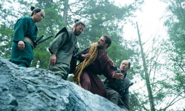 Cosmo Jarvis (with rope) as John Blackthorne with cast members in Shōgun
