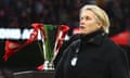 Emma Hayes walks past the League Cup after defeat by Arsenal last month