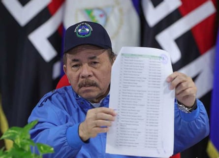 Daniel Ortega holds the list of names of the 222 political prisoners that were released, deported and deprived of citizenship during a press conference, in Managua, Nicaragua