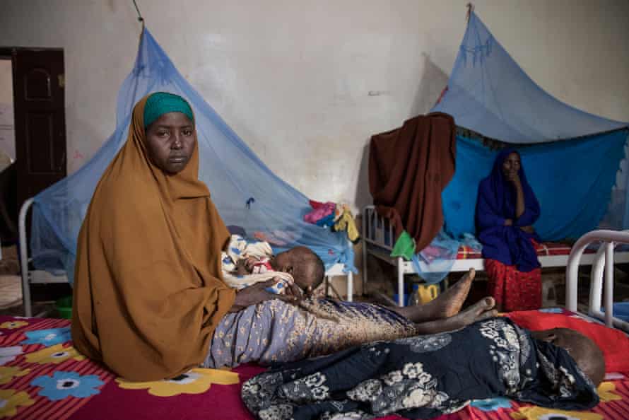 Abay with her two children. Baidoa, Somalia