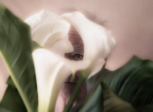 Junior category winner ‘Tony II’ shows the eye of an elderly man peering through the petals of a bouquet of flowers