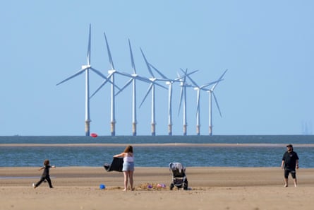 The wind turbines of Burbo Bank windfarm, New Brighton beach, UK, 24 August 2026.