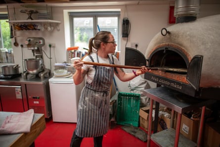 Webb using a wood-fired oven