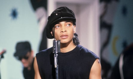 Terence Trent D’Arby on stage in 1987 wearing a baker boy cap