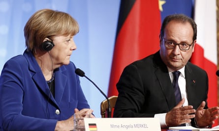German Chancellor Angela Merkel and French President Francois Hollande at a press conference