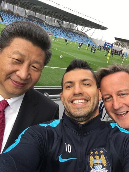 Chinese president Xi Jinping, Man City striker Sergio Aguero and then prime minister David Cameron at MCFC’s Etihad stadium in Manchester in 2015.