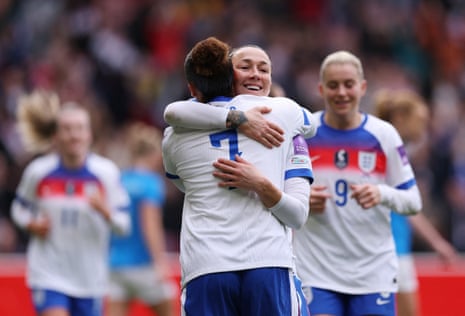 England’s Lucy Bronze celebrates scoring their first goal with Lauren James.