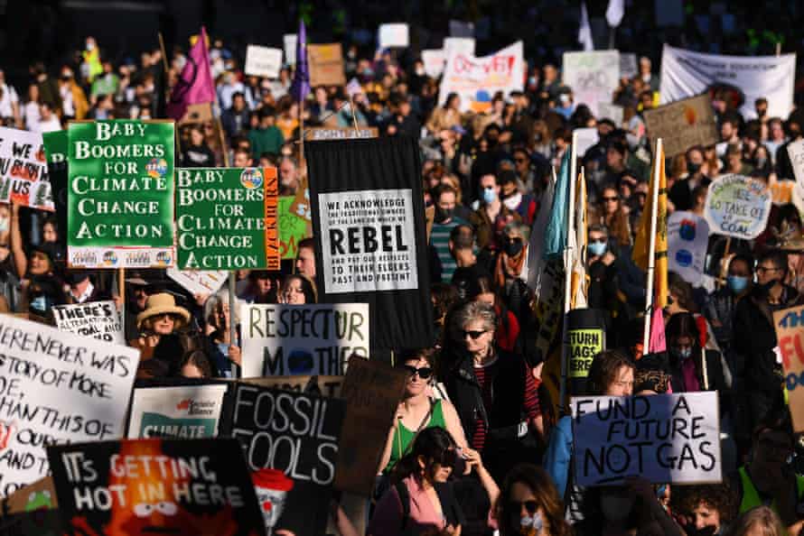 Climate strikers march in Melbourne on Friday.