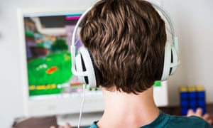 A boy playing Minecraft