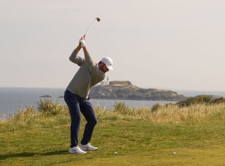 Scottie Scheffler plays his second shot on the 13th hole at the Scottish Open in North Berwick