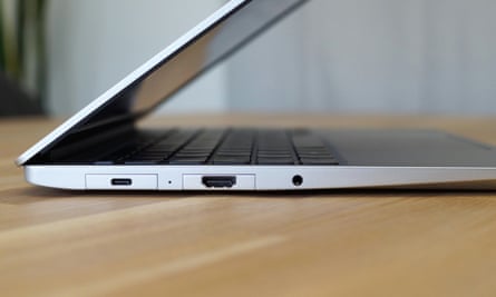 The side of the Framework Laptop 13 showing two port modules a headphones socket.