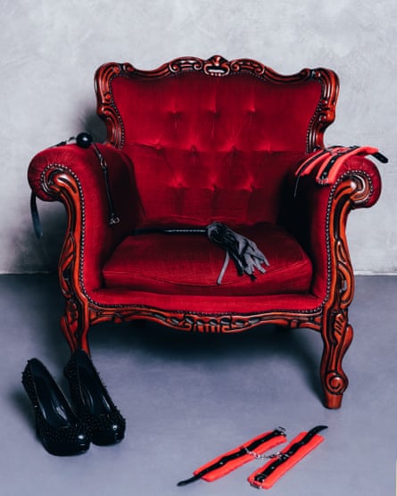 A chair laden with BDSM props