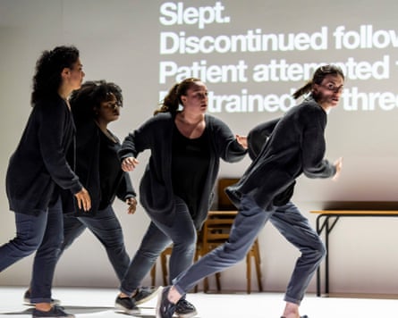 Actors from 4.48 Psychosis run in a line, caught mid-stride, beside projected text