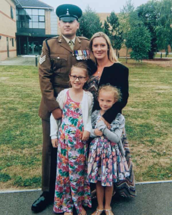 Neil and Becky Edwards and their two daughters.