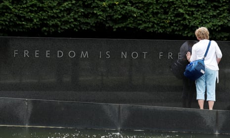 A woman visits the Korean War Veterans Memorial in Washington. 