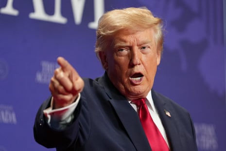 a man points while speaking