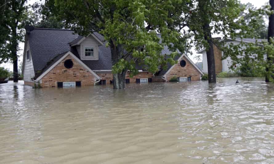 A home surrounded by floodwaters in Spring, Texas.