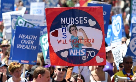 People march through London to mark 70 years of the NHS