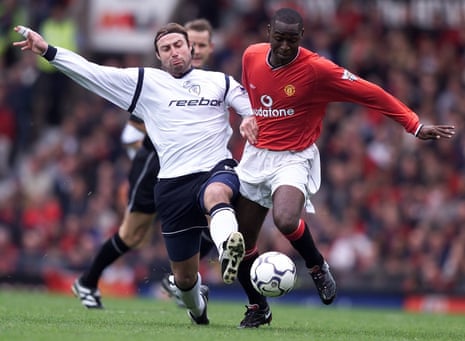 Paul Warhurst doing his thing for Bolton against Manchester United in 2001.