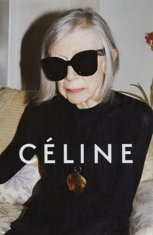 Joan Didion wears a simple black top and black statement sunglasses in an ad campaign for Céline in 2015.