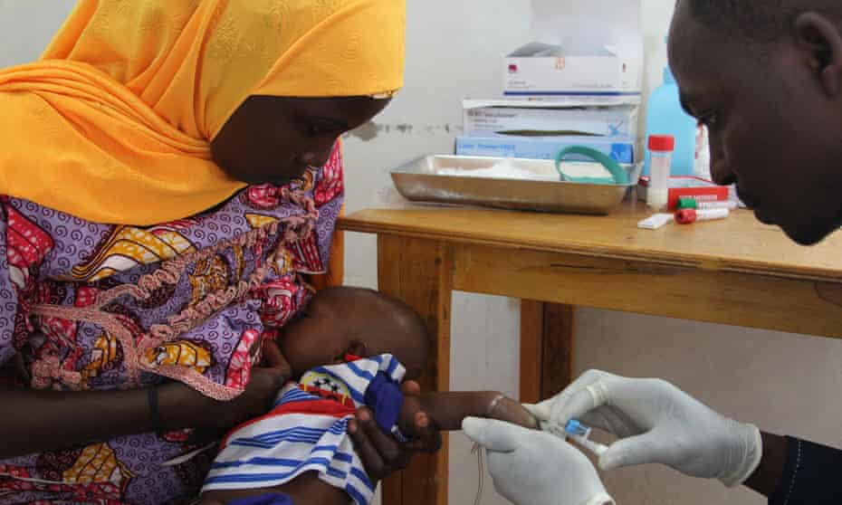 An eight-week old baby is vaccinated against eight antigens, including hepatitis B at the Madarounfa health centre in Niger. 
