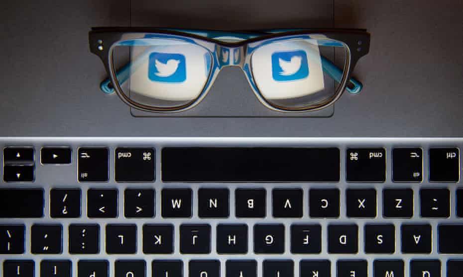 twitter logo in glasses