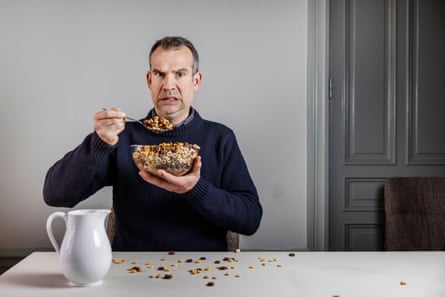 Chris van Tulleken grimaces at eating a huge of bowl of cereals